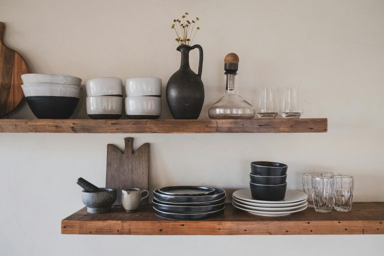 floating shelves with plates and decor